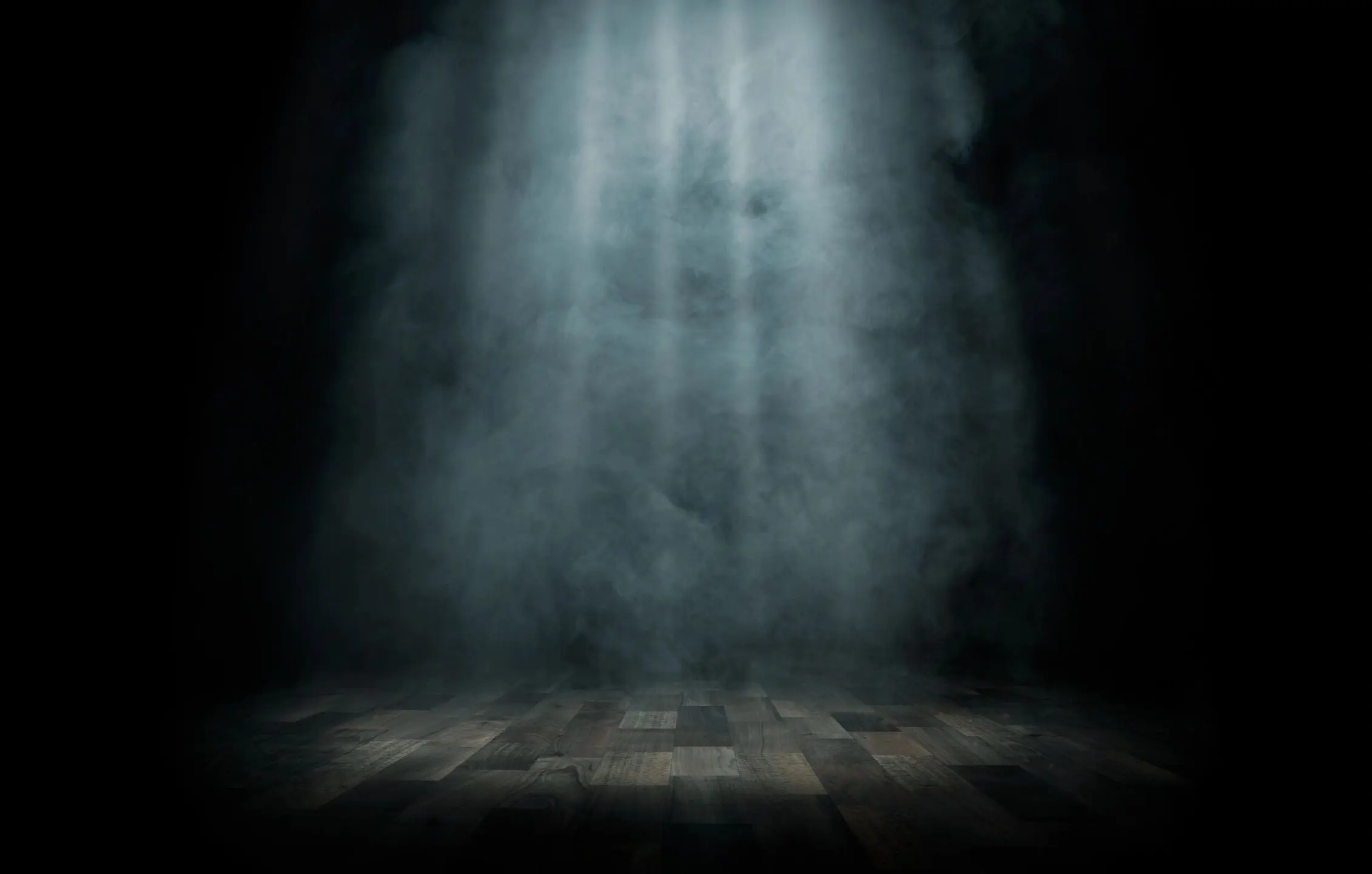 Mysterious spotlight and fog on stage