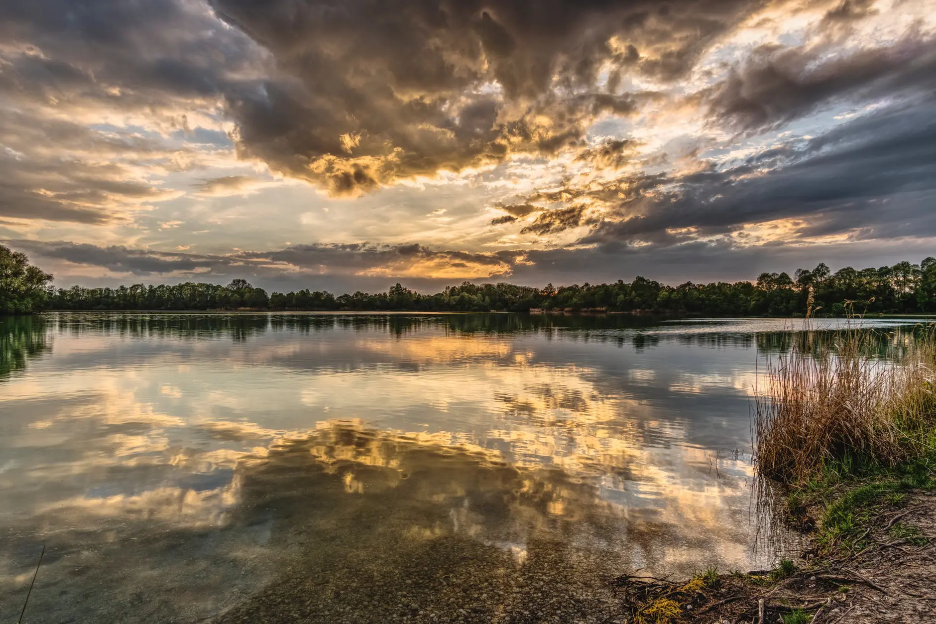 Sunset reflecting on tranquil lake