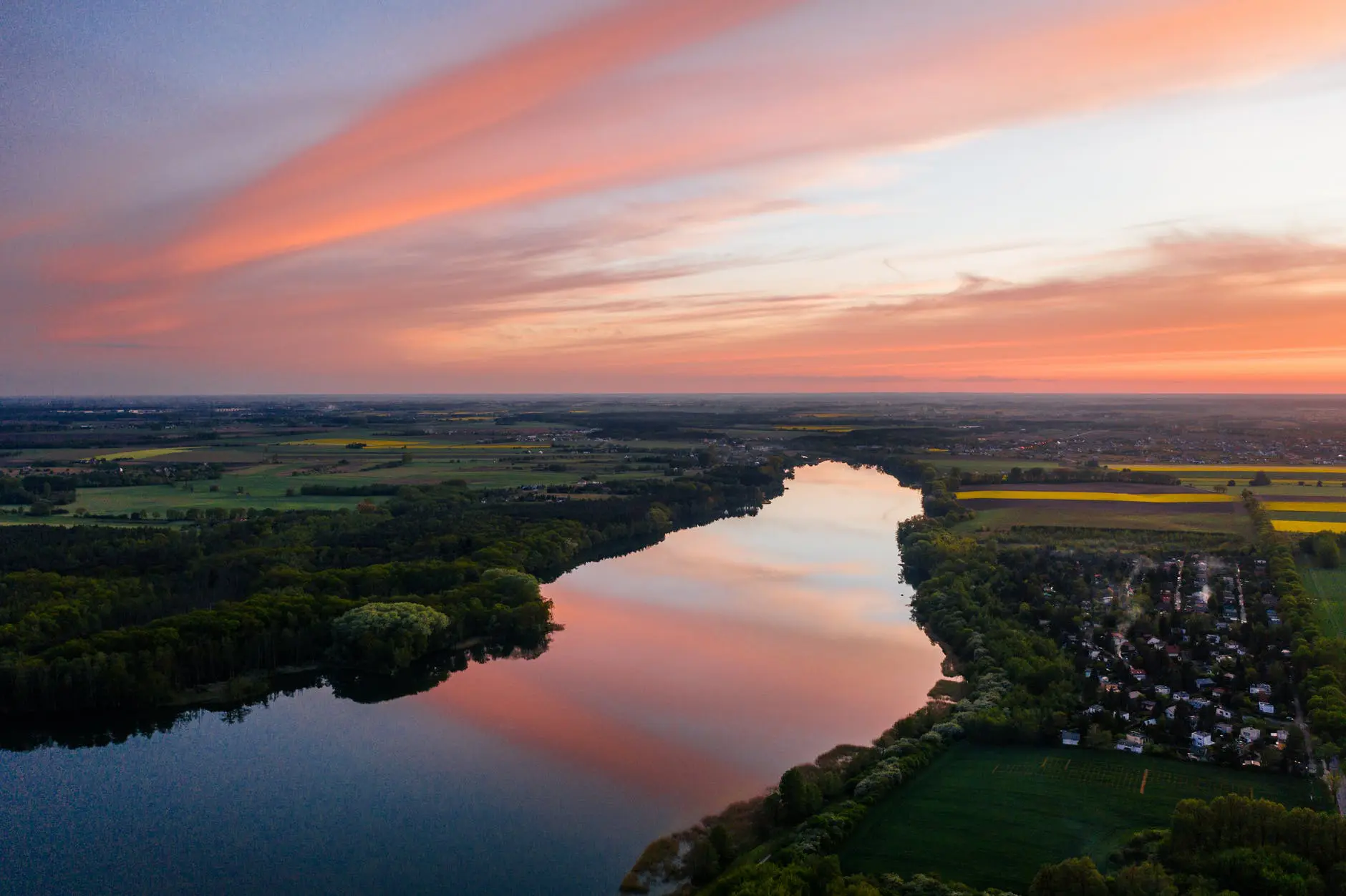 Sunset over a serene river landscape