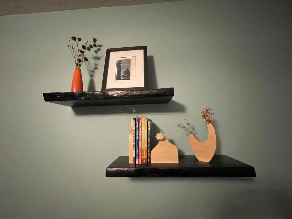 Floating shelves with decor and books.