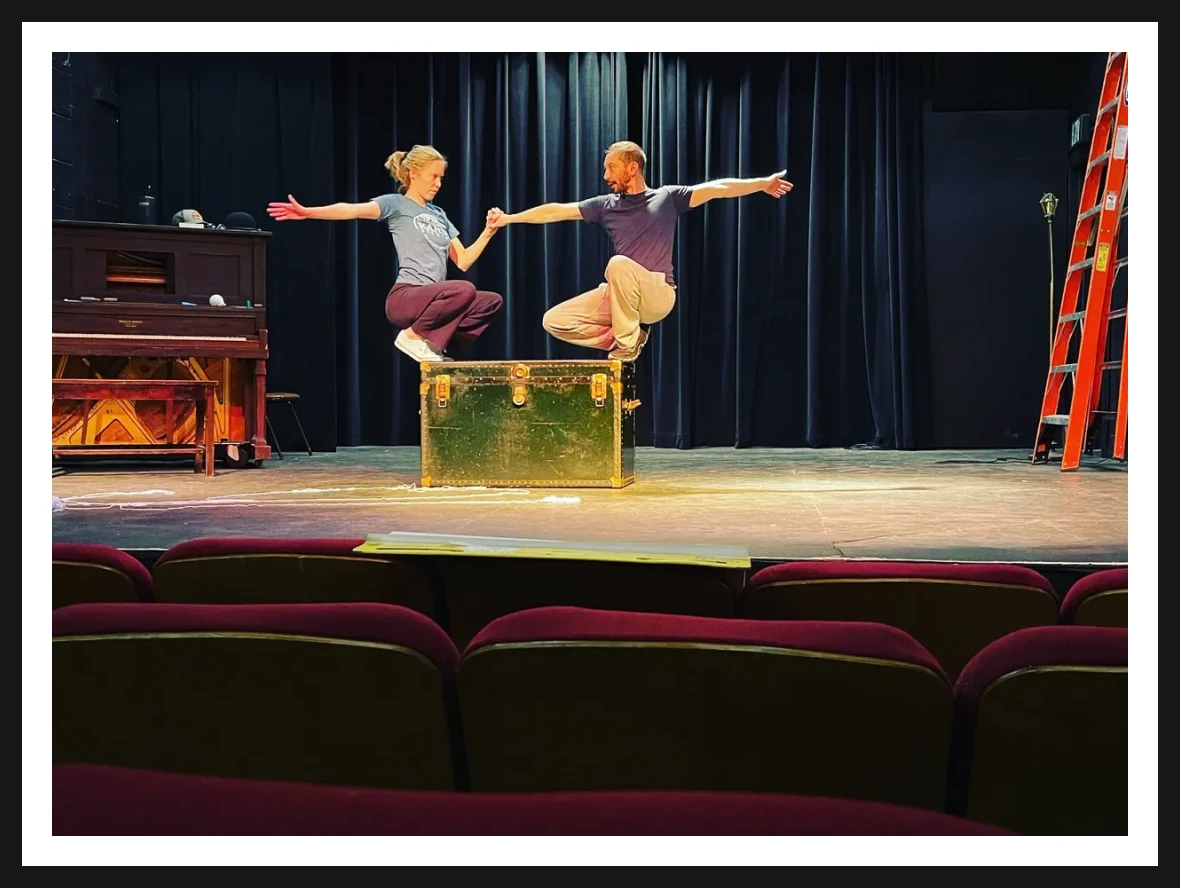 Stage rehearsal with dramatic pose