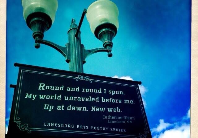 Poem displayed on streetlight background