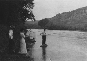 Group fishing in vintage attire
