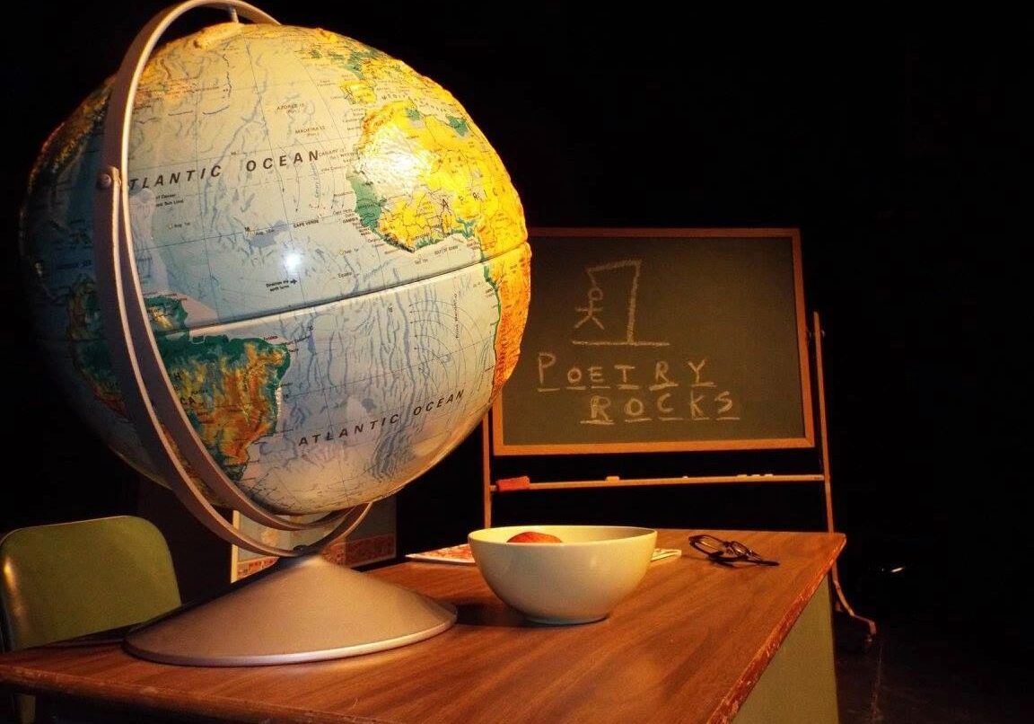 Desk with a globe and bowl