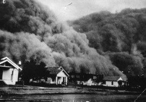 Dust storm approaching residential houses