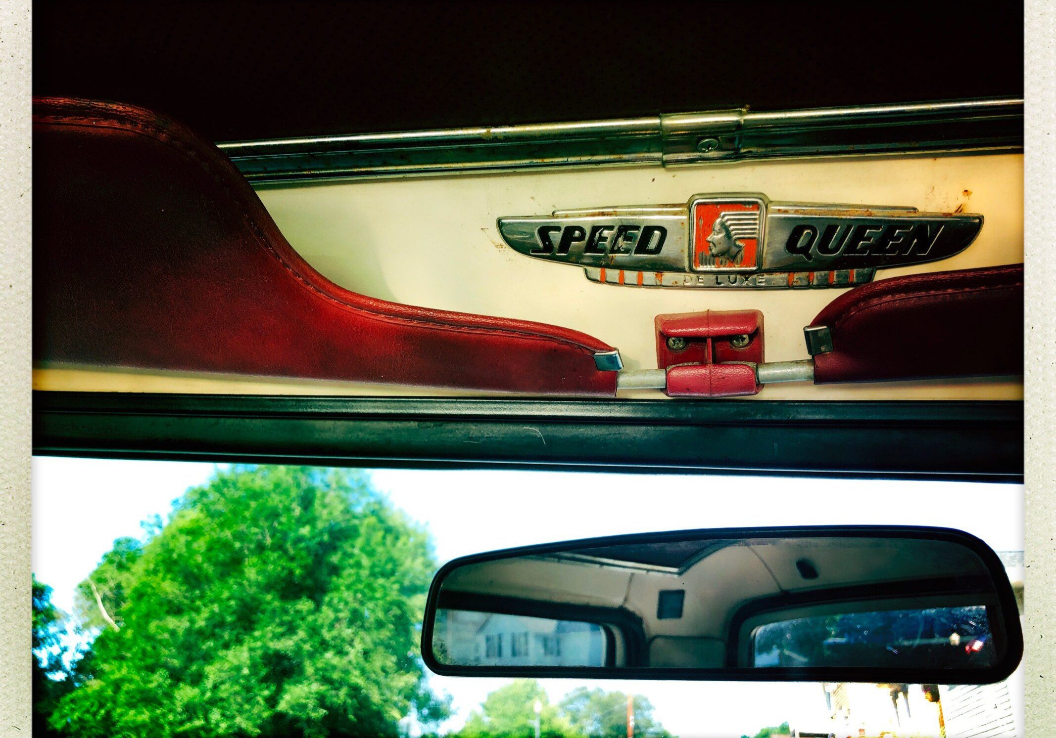 Vintage car interior with Speed Queen logo