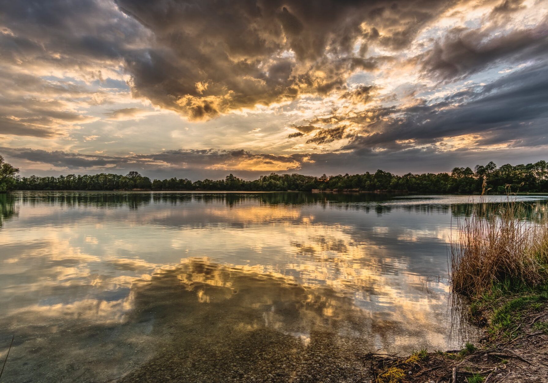 Sunset reflecting on tranquil lake