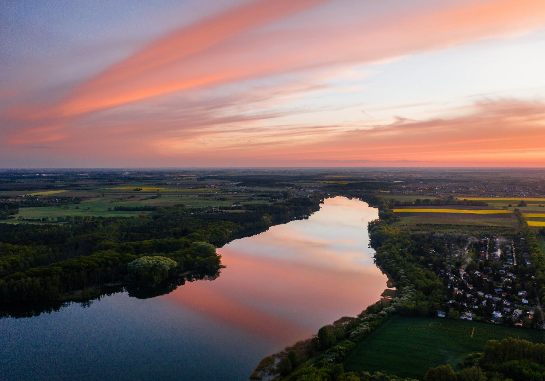 Sunset over a serene river landscape
